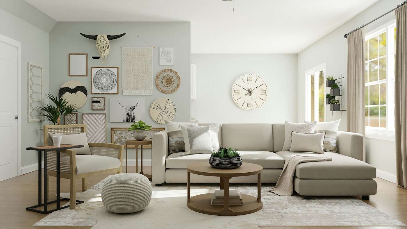 Neutral living room with a cream sectional sofa, rattan chair and decorative wall art